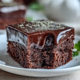 Close-up of rich Hojicha Fudge squares with a dense, fudgy texture, perfect for serving with hot tea.