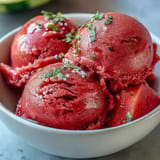Refreshing, vibrant Watermelon Sorbet (3 Ingredients) ready to be scooped and enjoyed.
