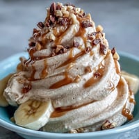 Creamy 4-Ingredient Peanut Butter Banana Ice Cream, a healthy frozen treat.